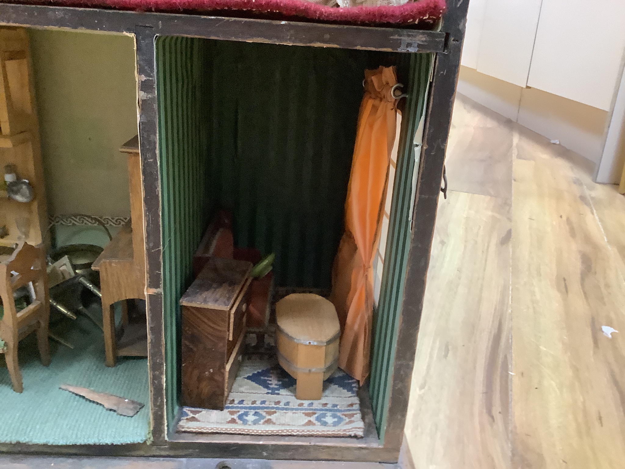 A furnished English dolls’ house, circa 1810-20, 104cm high